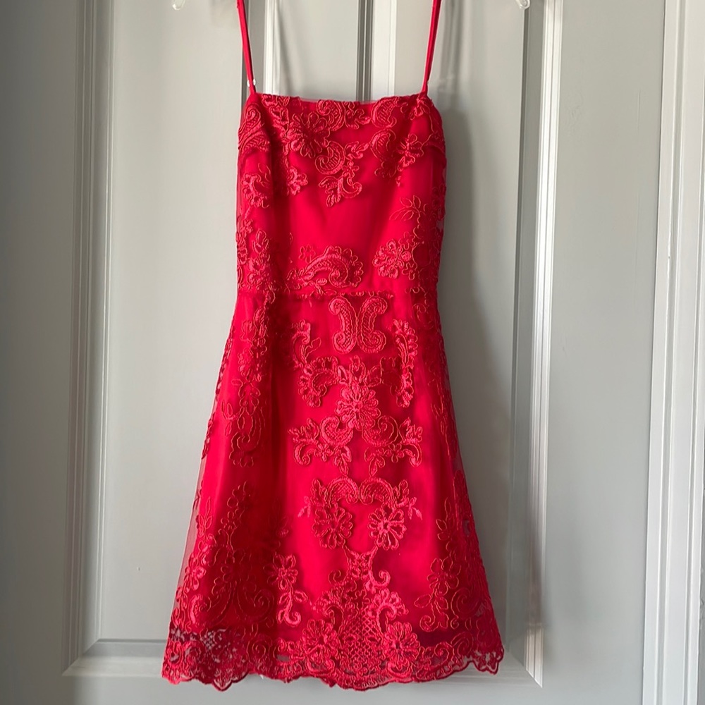 Red lace dress Size 2-4 worn once. Open back with adjustable tie & fully lined